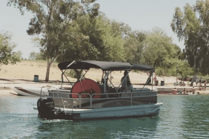 a small boat in a body of water