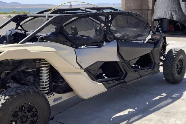 a motorcycle parked on the side of a vehicle