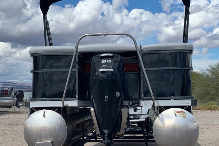 a person riding on the back of a truck